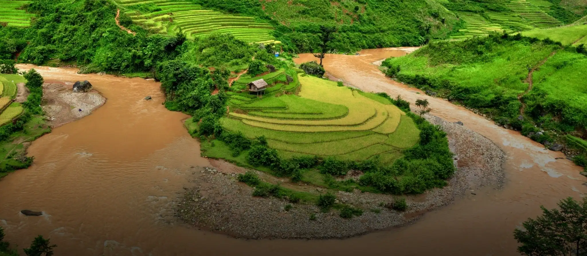 Rice terraces and a village in the mountains of northern Vietnam